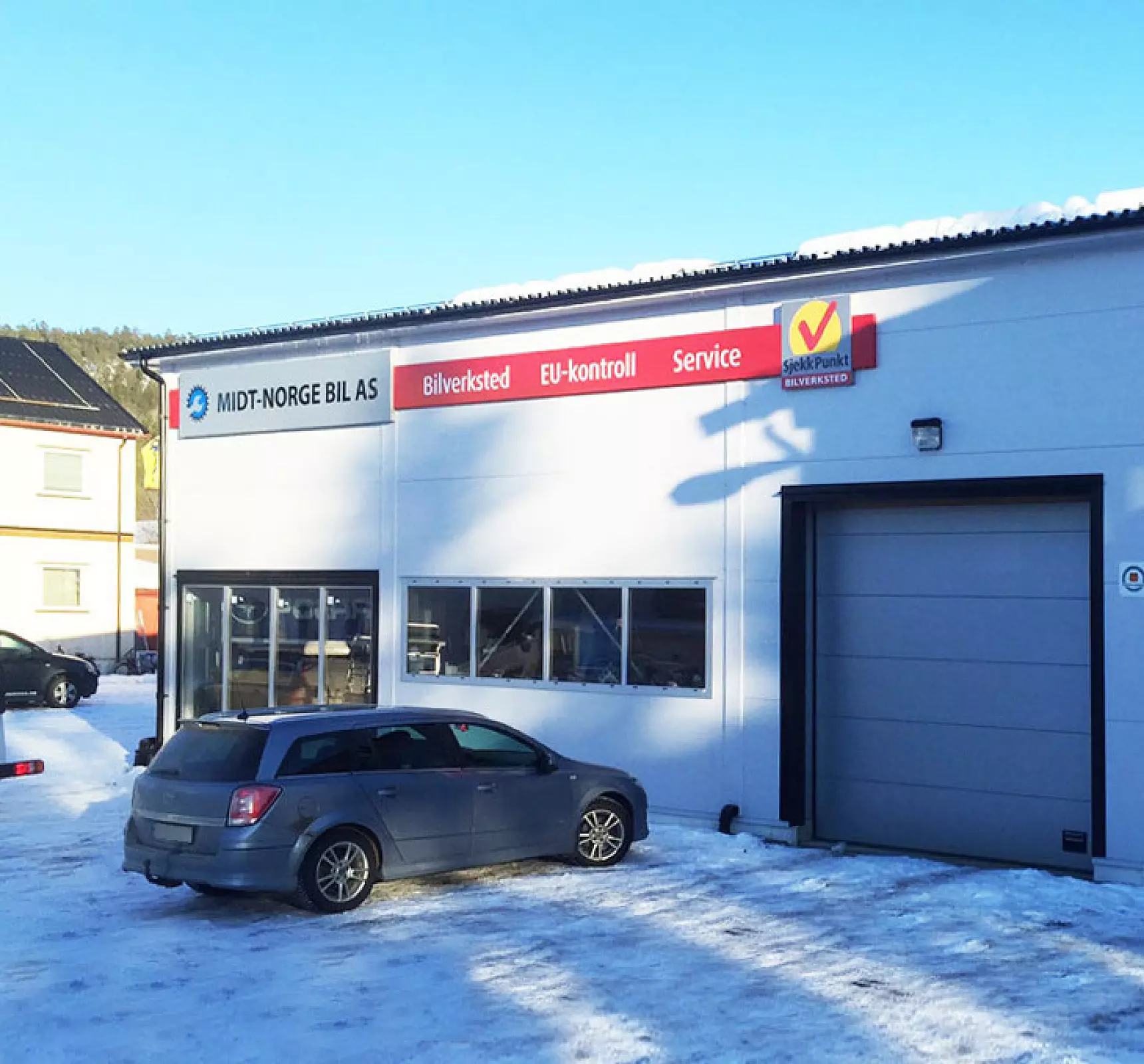 Fasaden til bilverkstedet Midt-Norge Bil AS
